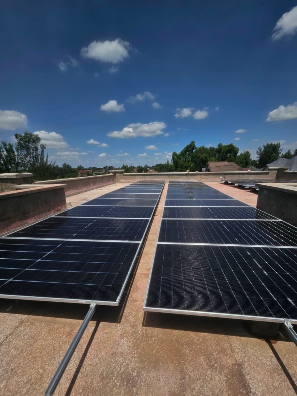 30kW three-phase solar system with 64kWh battery storage and 54 solar panels at a property in Parklands, Nairobi, Kenya.